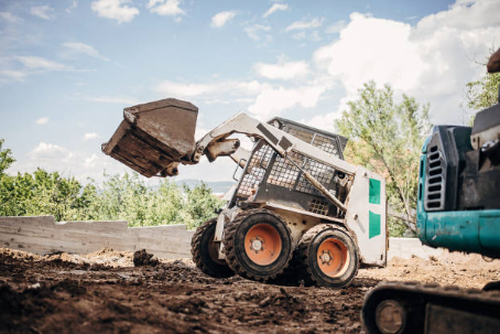 mini excavator vs skid steer